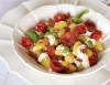 Gnocchi di patate con crema al pecorino, pomodorini confit e guanciale croccante