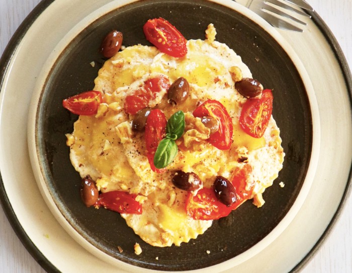 Girasoli cacio e pepe with walnut cream, confit cherry tomatoes and taggiasche olives