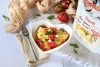 Girasoli alla parmigiana di melanzane e mozzarella con crudaiola di pomodori, olive taggiasche e capperi