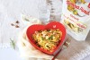 Girasoli ai fiori di zucca e stracciatella con gamberi, zucchine grigliate e mandorle